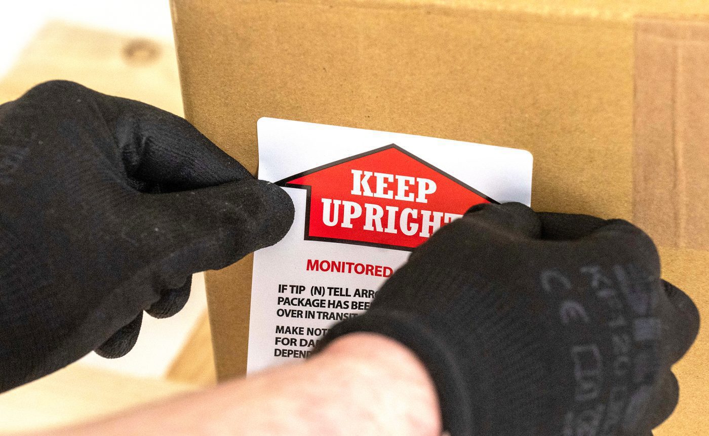 Tilt indicator labels are self adhesive